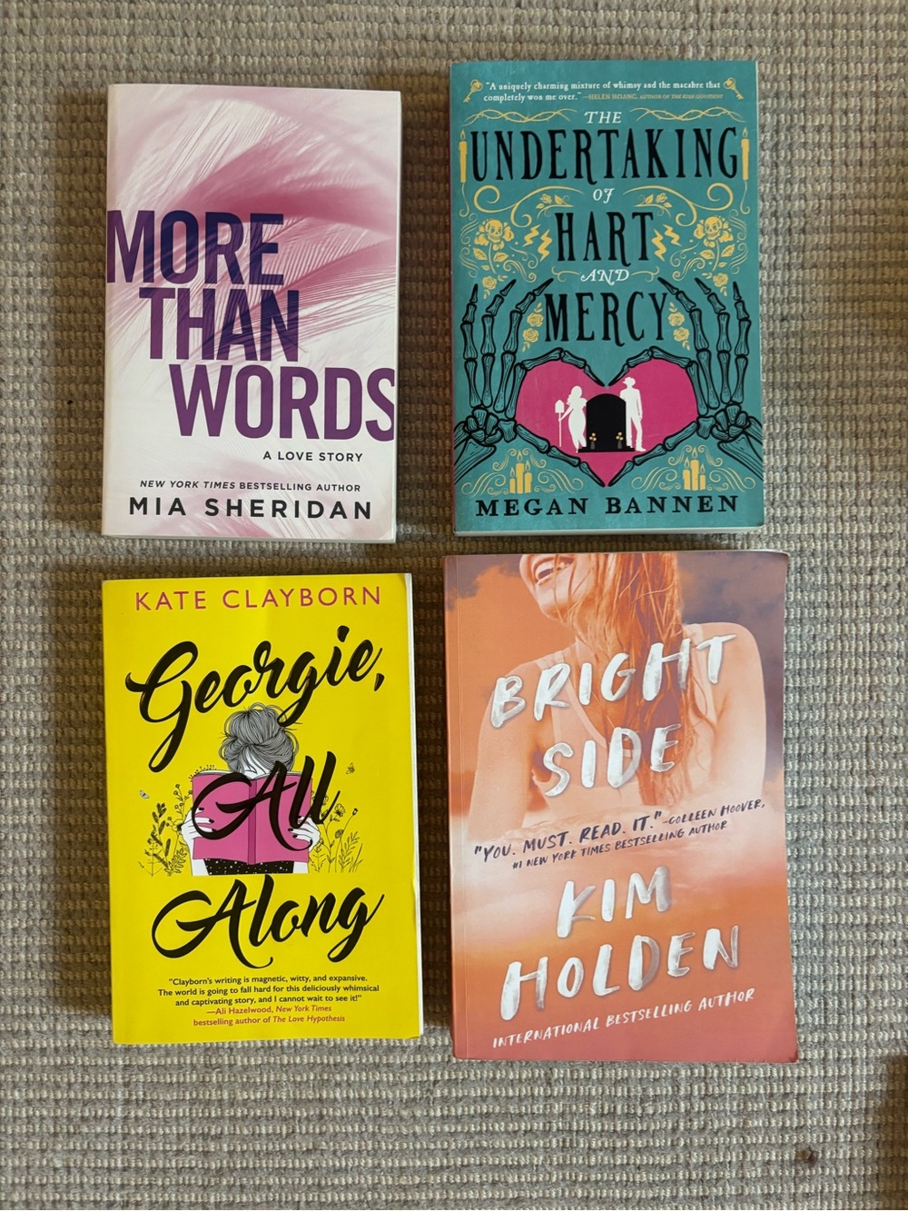 Assorted romance books: Mia Sheridan and other authors